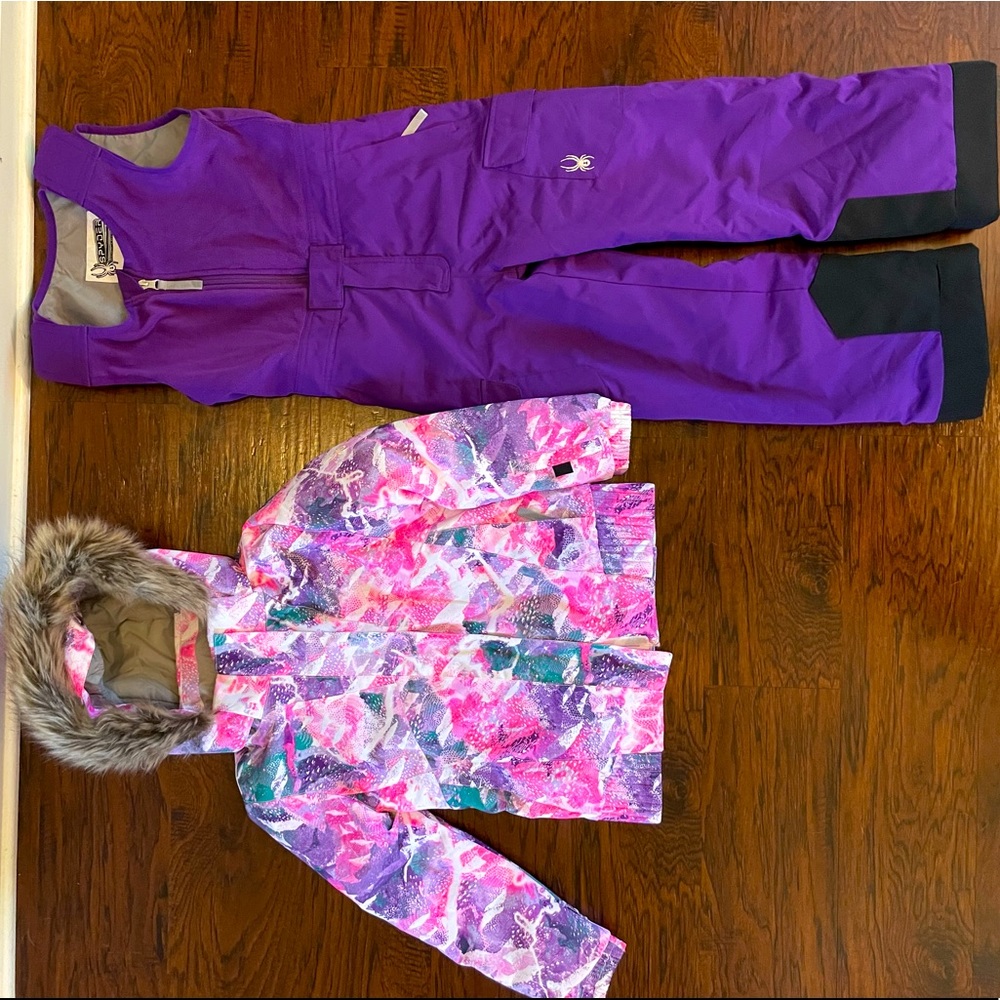 Girls size 7 Spyder ski jacket and matching bib. In like new condition